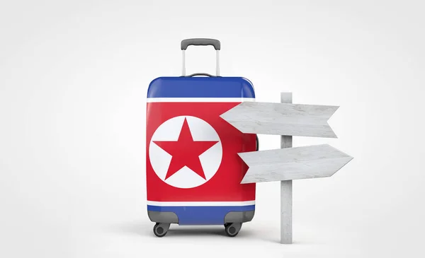 Nordkoreas Flaggenreisekoffer mit hölzernem Wegweiser. 3D-Darstellung — Stockfoto