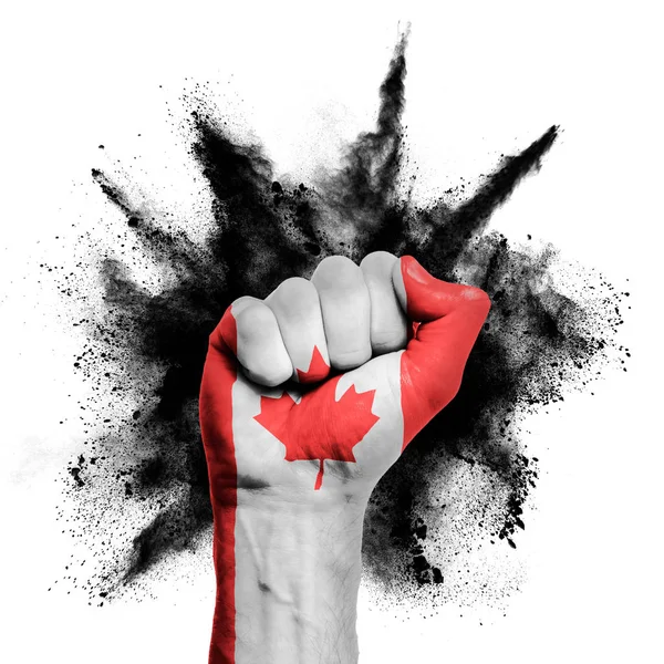 加拿大用火药爆炸、权力、抗议的概念举起拳头 — 图库照片