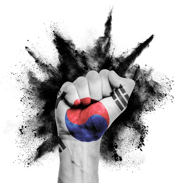 Corea del Sur levantó el puño con explosión de pólvora, poder, concepto de protesta —  Fotos de Stock