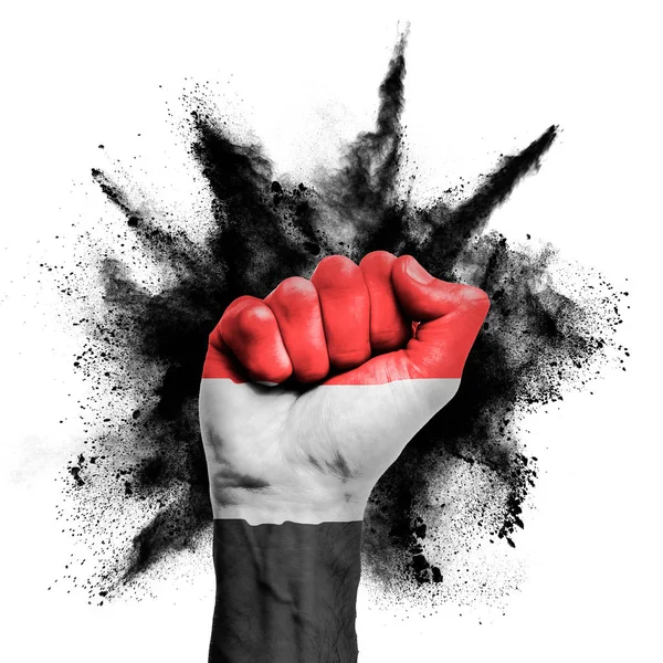 Yemen raised fist with powder explosion, power, protest concept — Stock Photo, Image