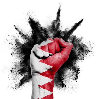 Bahrain raised fist with powder explosion, power, protest concept