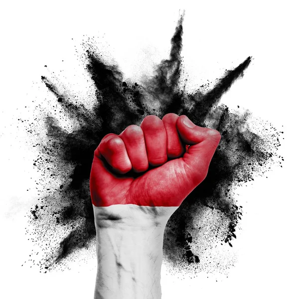 Indonesia raised fist with powder explosion, power, protest concept — Stock Photo, Image