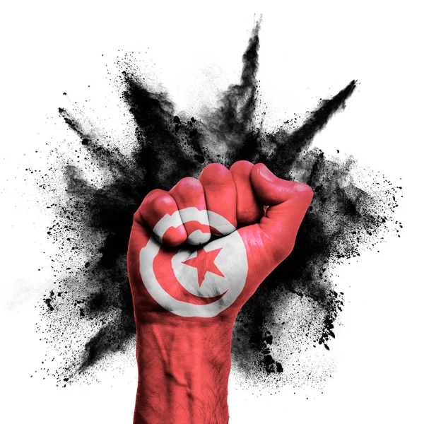 Tunisia raised fist with powder explosion, power, protest concept — Stock Photo, Image