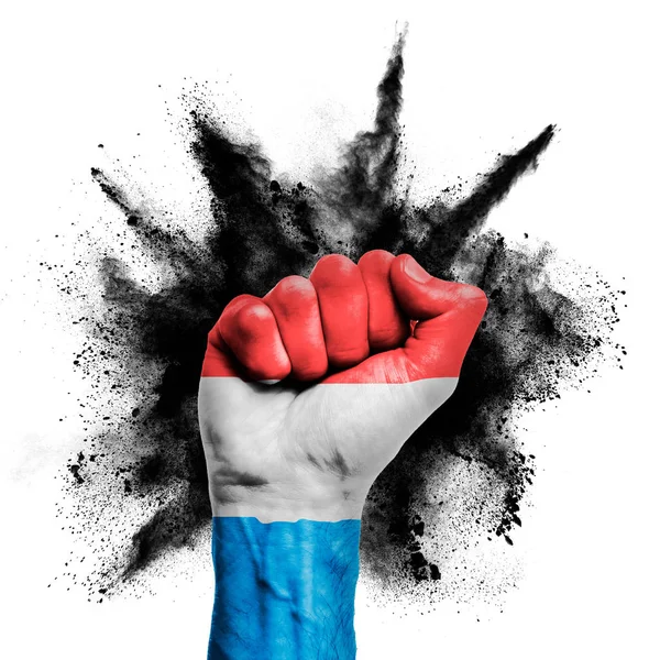 Luxembourg raised fist with powder explosion, power, protest concept