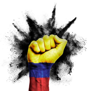 Colombia raised fist with powder explosion, power, protest concept
