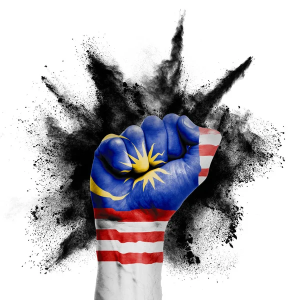 Malaysia raised fist with powder explosion, power, protest concept — 스톡 사진
