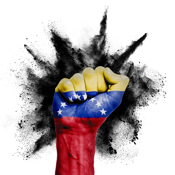 Wenezuela podniósł pięść z wybuchem proszku, moc, koncepcja protestu — Zdjęcie stockowe