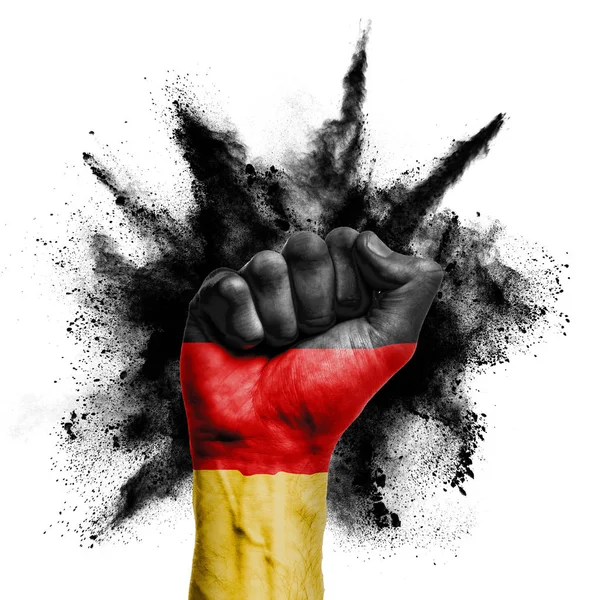 Германия подняла кулак с пороховым взрывом, властью, протестной концепцией — стоковое фото