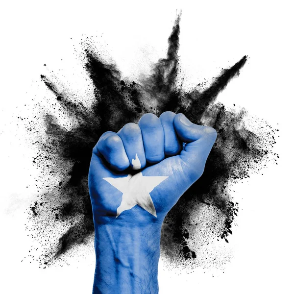 Somalia raised fist with powder explosion, power, protest concept — Stock Photo, Image
