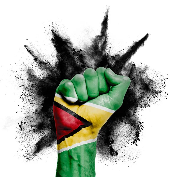 Guyana raised fist with powder explosion, power, protest concept — Stock Photo, Image