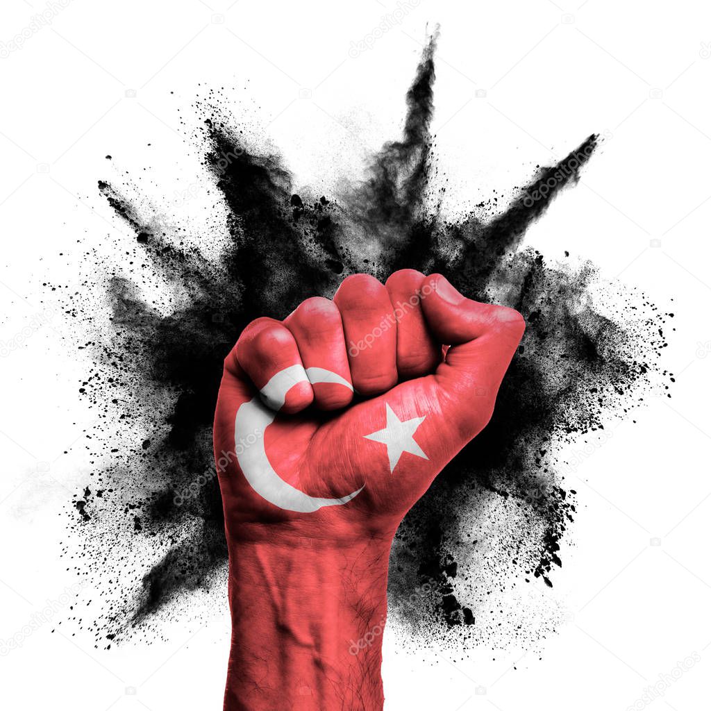 Turkey raised fist with powder explosion, power, protest concept