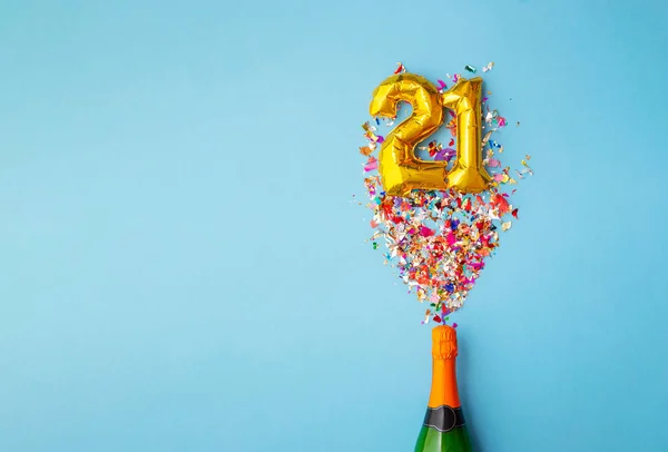 21ste verjaardag champagne fles ballon pop — Stockfoto