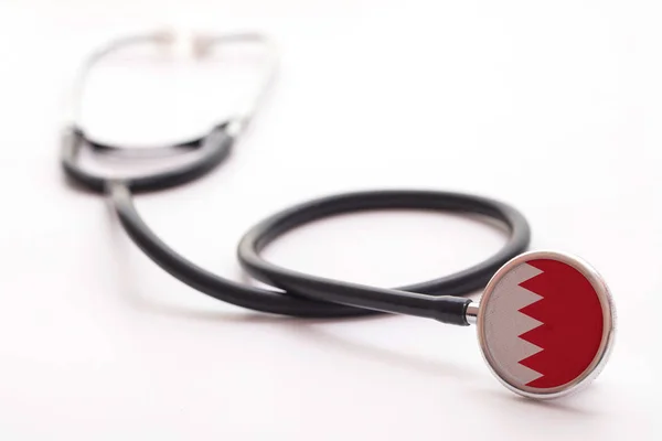 Bahrein gezondheidszorg concept. Medische stethoscoop met landvlag — Stockfoto