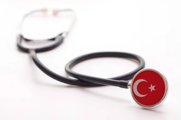 Turquia conceito de saúde. Estetoscópio médico com bandeira do país — Fotografia de Stock