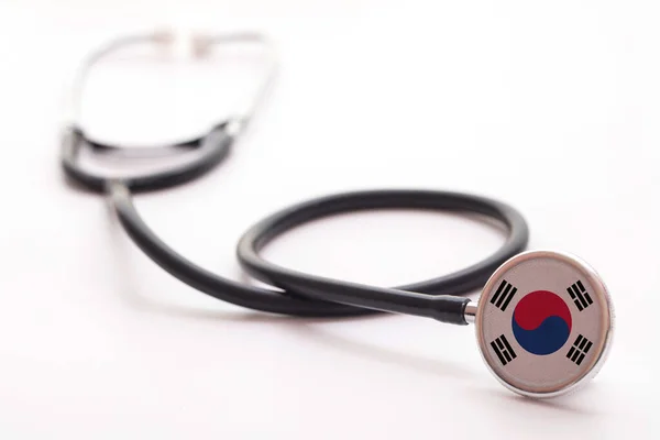 Dél-Korea egészségügyi koncepciója. Orvosi sztetoszkóp ország zászlóval — Stock Fotó
