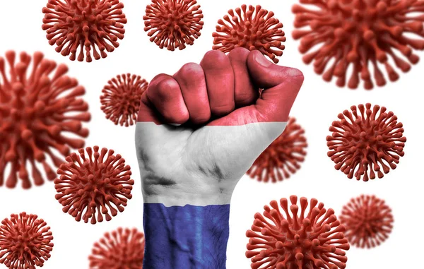 Netherlands flag fist fighting off coronavius disease — Stock Photo, Image