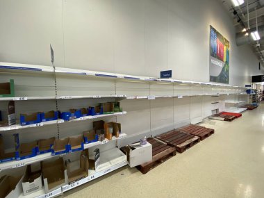 OXFORD, UK - March 16th 2020: Empty supermarket shelves at a local grocery store as people prepare for coronavirus lockdown