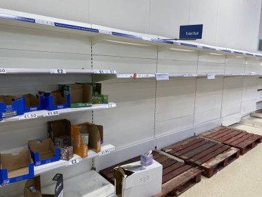 OXFORD, UK - March 16th 2020: Empty supermarket shelves at a local grocery store as people prepare for coronavirus lockdown
