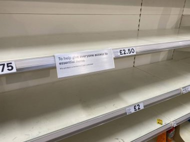 OXFORD, UK - March 16th 2020: Empty supermarket shelves at a local grocery store as people prepare for coronavirus lockdown