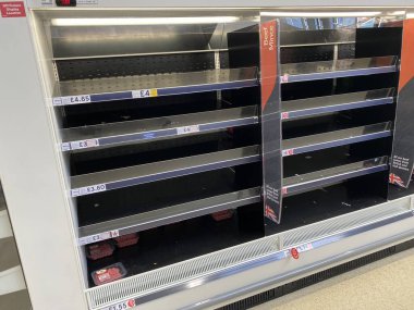 OXFORD, UK - March 16th 2020: Empty supermarket shelves at a local grocery store as people prepare for coronavirus lockdown