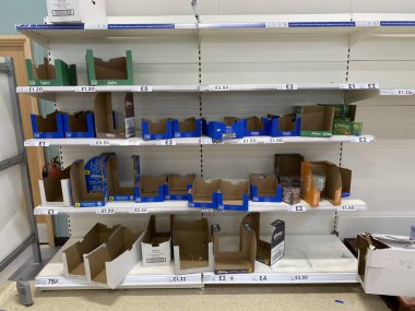 OXFORD, UK - March 16th 2020: Empty supermarket shelves at a local grocery store as people prepare for coronavirus lockdown