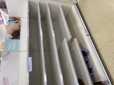 OXFORD, UK - March 16th 2020: Empty supermarket shelves at a local grocery store as people prepare for coronavirus lockdown