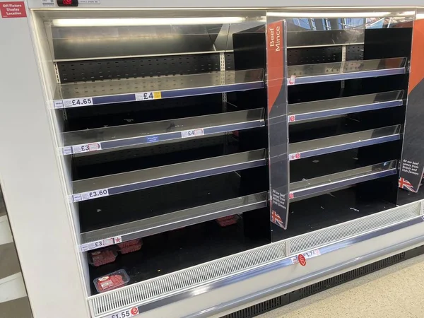 OXFORD, UK - March 16th 2020: Empty supermarket shelves at a local grocery store as people prepare for coronavirus lockdown