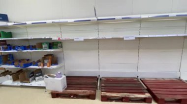 OXFORD, UK - March 16th 2020: Empty supermarket shelves at a local grocery store as people prepare for coronavirus lockdown