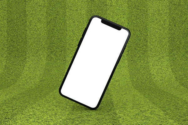 智能手机的绿色运动场上有一个空白的白色屏幕。3D渲染 — 图库照片