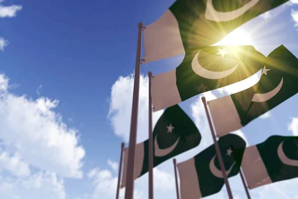 Pákistánské vlajky vlající ve větru proti modré obloze. 3D vykreslování — Stock fotografie