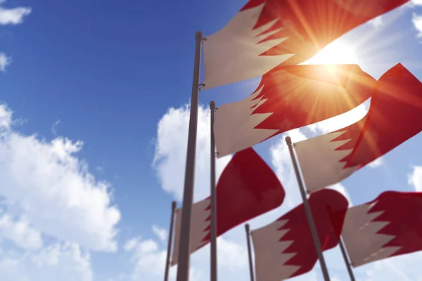 Bahrein zászlók lobognak a szélben a kék ég ellen. 3D Renderelés — Stock Fotó