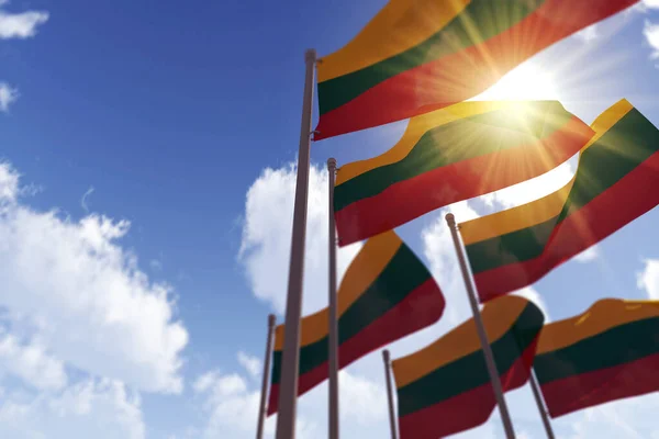 Lithuania flags waving in the wind against a blue sky. 3D Rendering — Stock Photo, Image