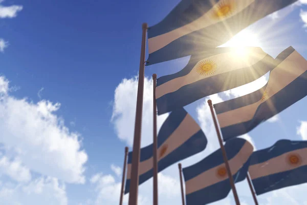 Σημαίες Αργεντινής κυματίζουν στον άνεμο πάνω σε έναν γαλάζιο ουρανό. 3D απόδοση — Φωτογραφία Αρχείου