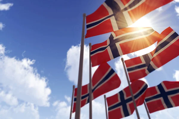 Bandeiras da Noruega acenando ao vento contra um céu azul. Renderização 3D — Fotografia de Stock