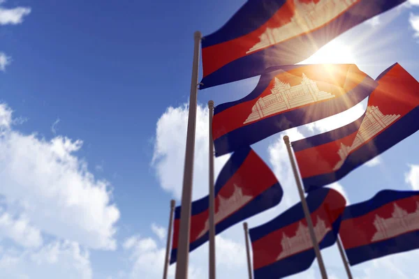 Banderas de Camboya ondeando en el viento contra un cielo azul. Renderizado 3D — Foto de Stock