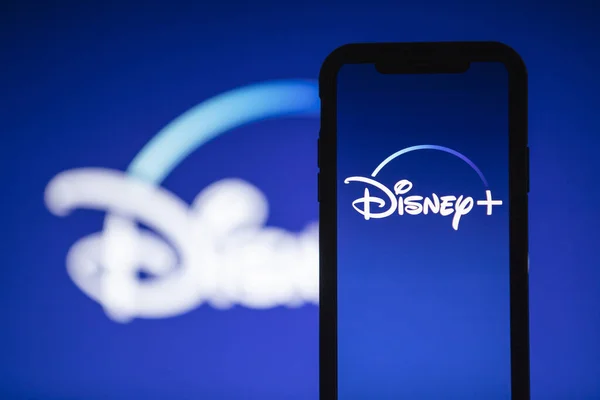 LONDON, UK - April 17 2020: Disney plus streaming service logo on a smartphone — Stock Photo, Image