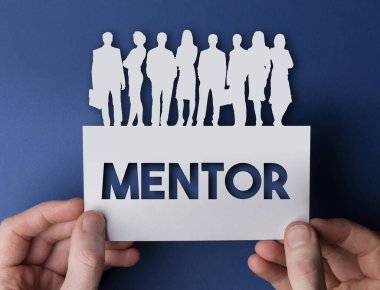 Akıl hocası olan beyaz kartlı bir iş adamının imzası.