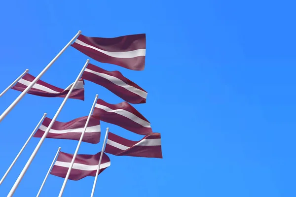 Σημαίες της Λετονίας κυματίζουν στον άνεμο πάνω από έναν γαλάζιο ουρανό. 3D απόδοση — Φωτογραφία Αρχείου