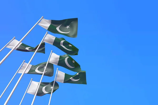Pákistánské vlajky vlající ve větru proti modré obloze. 3D vykreslování — Stock fotografie