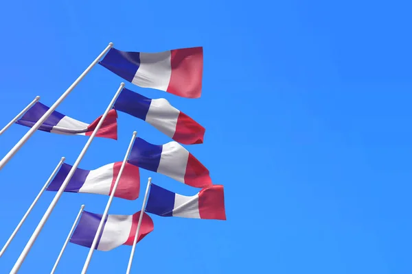 Drapeaux de France agitant dans le vent contre un ciel bleu. Rendu 3D — Photo