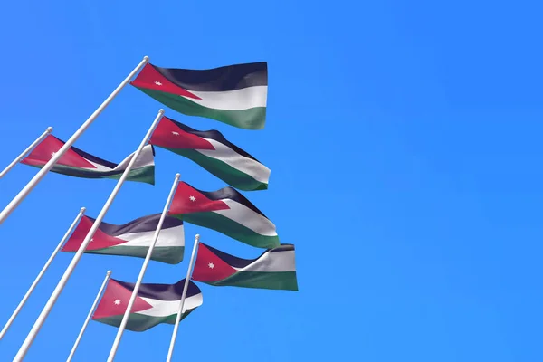 Jordan flags waving in the wind against a blue sky. 3D Rendering — Stock Photo, Image