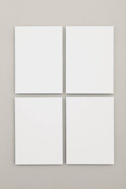 Kartvizit afişi maketi. Gri arkaplanda beyaz kart