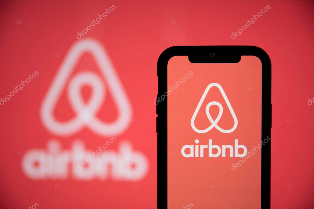 LONDON, UK - May 15 2020: Airbnb home holiday rental logo on a smartphone screen