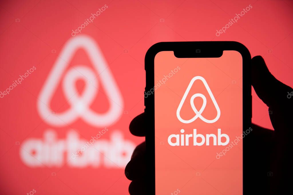 LONDON, UK - May 15 2020: Airbnb home holiday rental logo on a smartphone screen