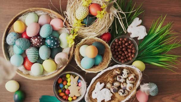 Feathers Falling Colorful Easter Eggs Nest Spring Flowers Wooden Table — Stock Video