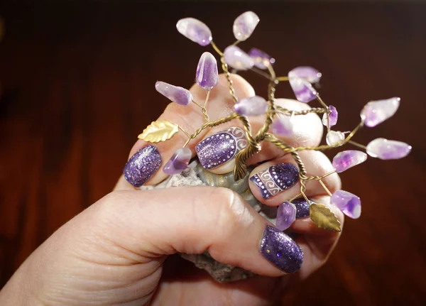 Interesting holiday nail art design with purple glitter — Stock Photo, Image