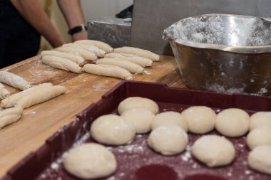 Work in the bakery - closeup of white bread