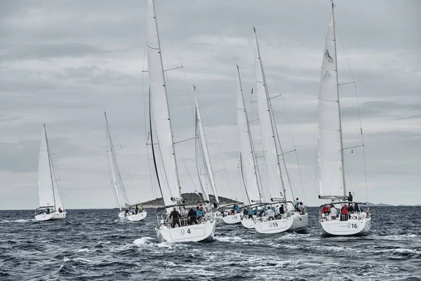 Croatia, Adriatic Sea, 19 September 2019: The race of sailboats, a regatta, rainy weather, Intense competition, island on background — Stock Photo, Image
