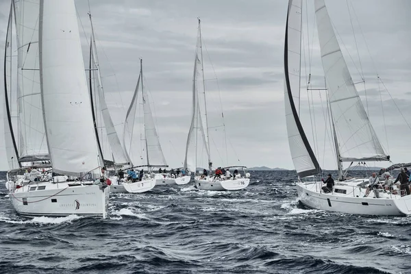 Croatia, Adriatic Sea, 19 September 2019: The race of sailboats, a regatta, rainy weather, Intense competition, island on background — Stock Photo, Image
