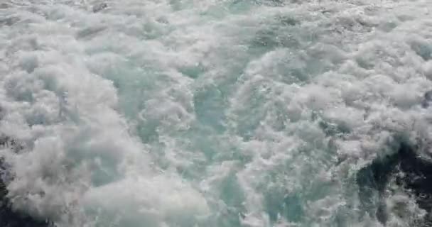 Slow motion of the foamy path from the yacht, the boat goes by sea, raging stream of sea water from under the ship at sunset, high speed, luxury life, a clear sunny weather, the Ligurian Sea, nobody — Stock Video